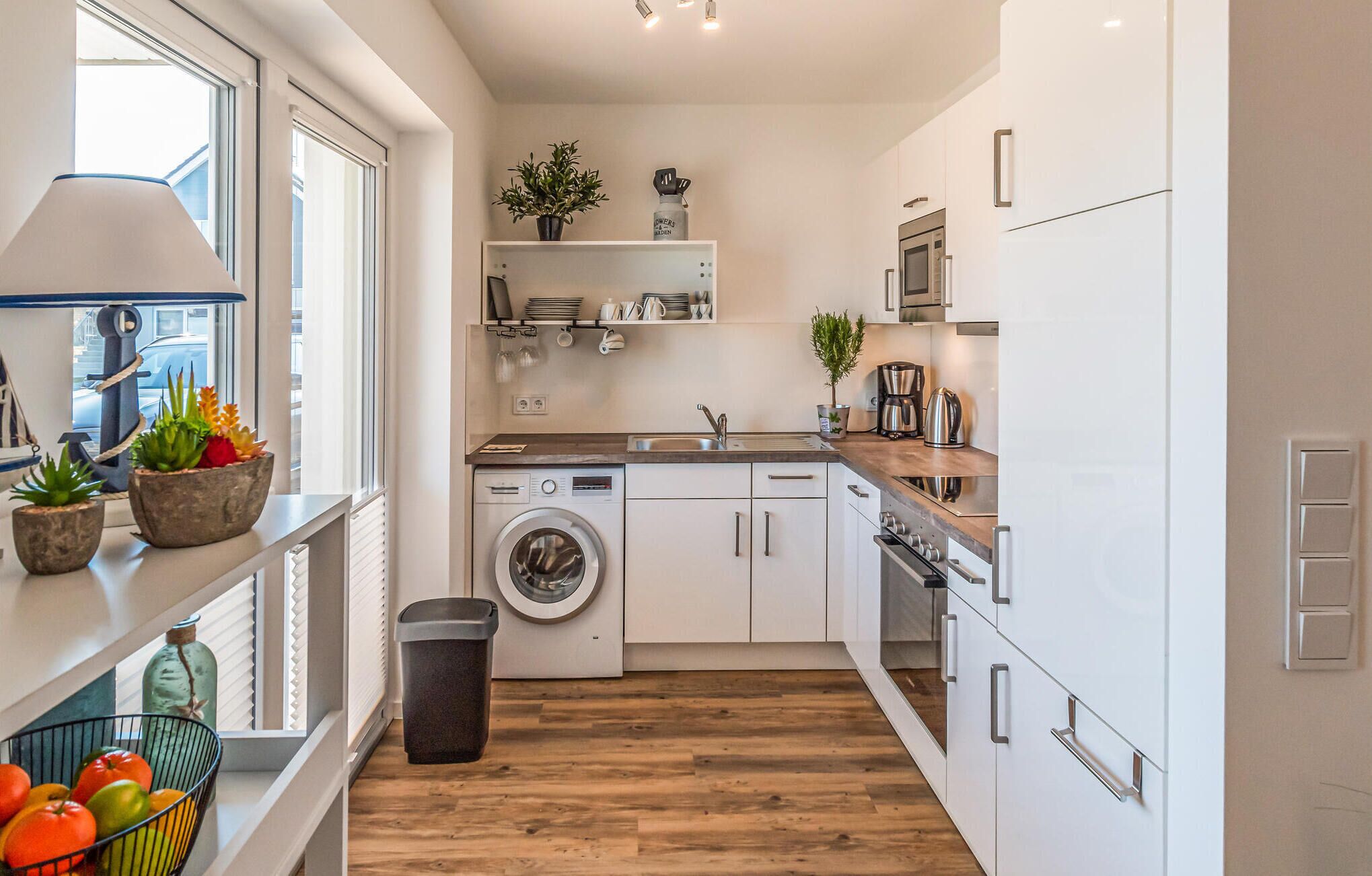 Fridge, stovetop, dishwasher, coffee/tea maker