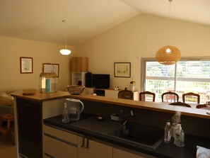 Coffee/tea maker, fridge, microwave, oven