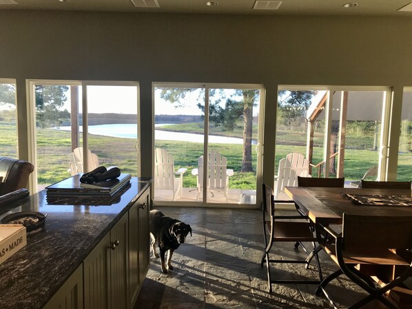 Relax in this spacious room with an outdoor area, perfect for unwinding with a book or enjoying the fresh air from the sliding glass door.