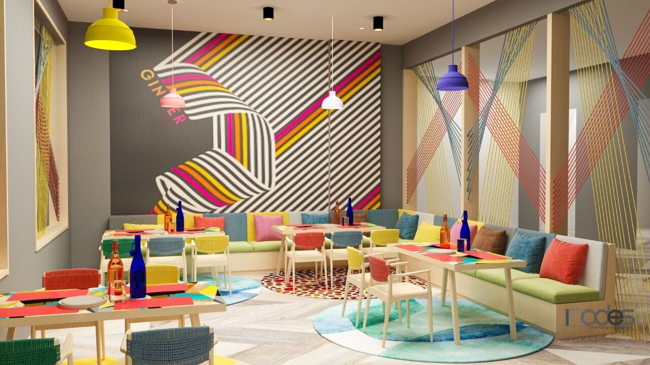 Een levendige kinderspeelruimte met kleurrijk meubilair en een groot abstract schilderij op de muur.