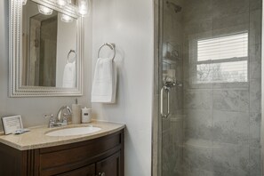 Combined shower/bathtub, hair dryer, towels, soap