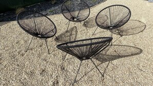 Four black wireframe chairs on a gravel surface. - #Casafouilloy Apartment with large terrace (Fouilloy)