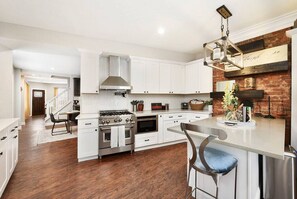 Fridge, microwave, oven, stovetop - ★ HostWise Stays ★ Family-Friendly Home| Sauna & Tub, Near Butler St. (Pittsburgh)