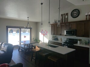 Microwave, dishwasher, coffee/tea maker, cookware/dishes/utensils