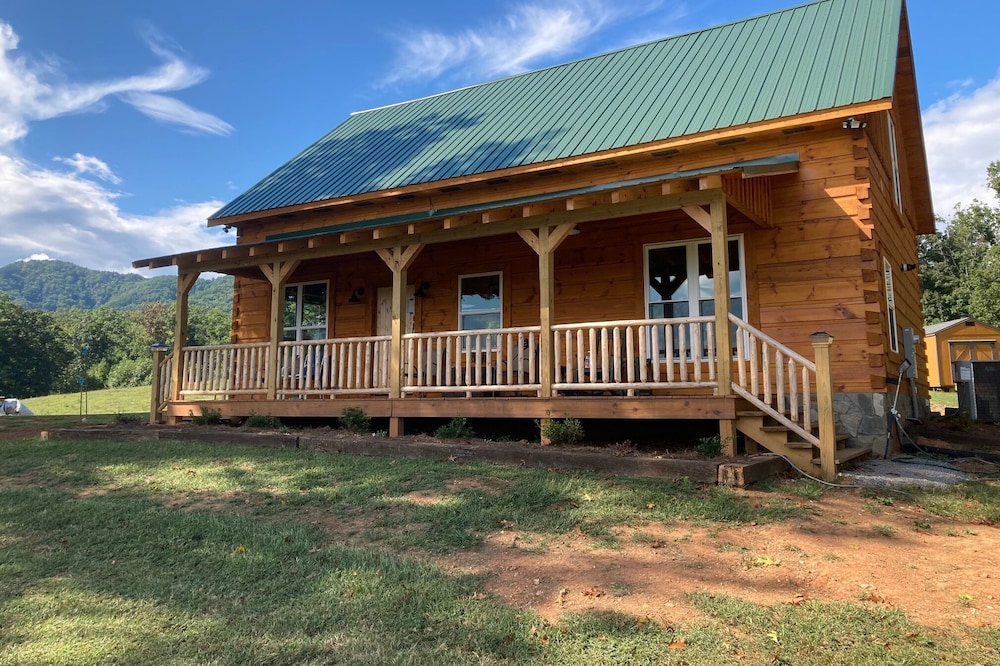 Brand new Log Cabin. Secluded on 62 acres