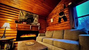 Smart-TV, Kamin, Bücher, Stereoanlage