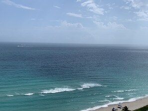 On the beach, sun loungers, beach towels