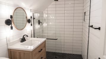 Combined shower/tub, hair dryer, towels, soap