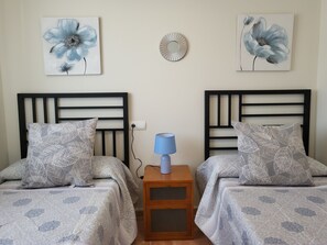 2 dormitorios, tabla de planchar con plancha, wifi gratis y ropa de cama