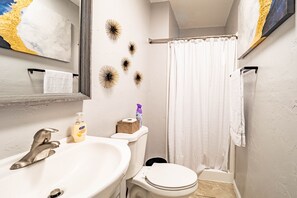 Combined shower/bathtub, hair dryer, towels, soap