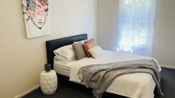 2 bedrooms, desk, iron/ironing board, travel cot