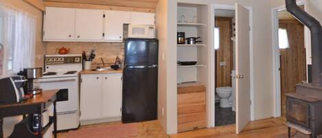 Brule Cottage | Private kitchen | Microwave, coffee/tea maker, freezer