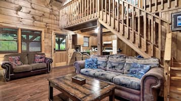 Basic Cabin | Living area | 50-inch LED TV with satellite channels, TV, fireplace