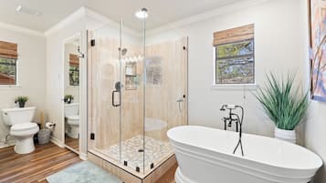 Bathtub, hair dryer, towels, soap