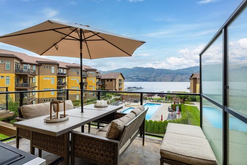 Okanagan Lake Beachfront Penthouse. 2 Bedrooms + den, 3 bath. Boatslip Option. 