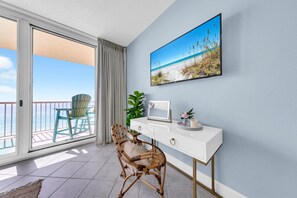 Enjoy ocean views from the balcony through the large sliding glass door.