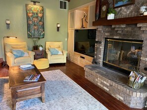 Smart TV, fireplace, DVD player, books