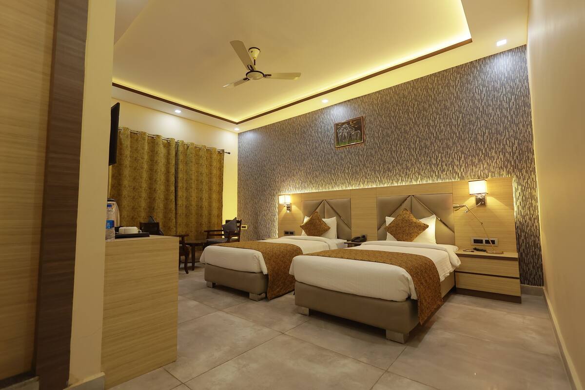 Premium bedding, desk, laptop workspace, blackout curtains