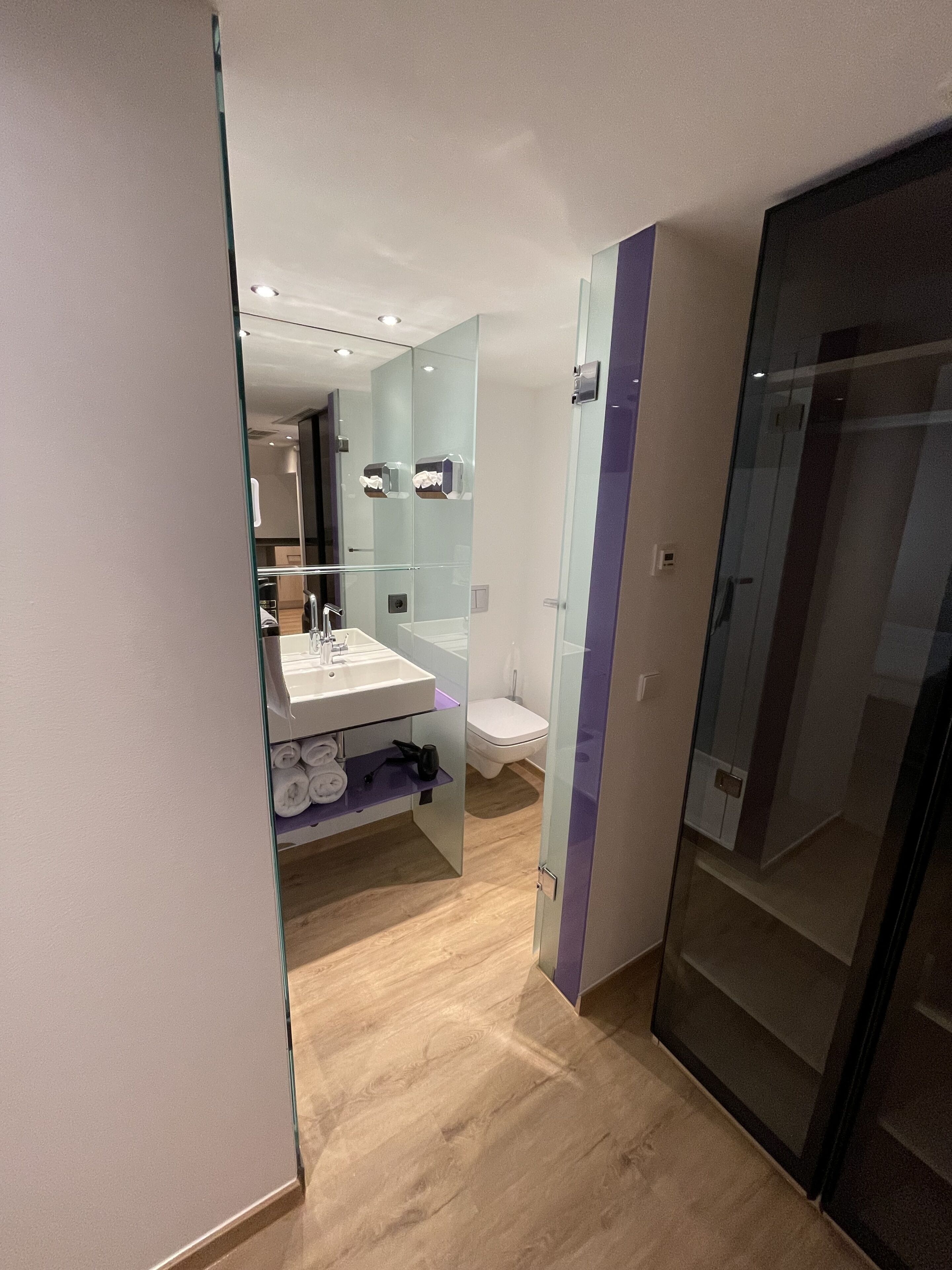 family studio | bathroom | shower, rainfall showerhead, hair dryer, slippers