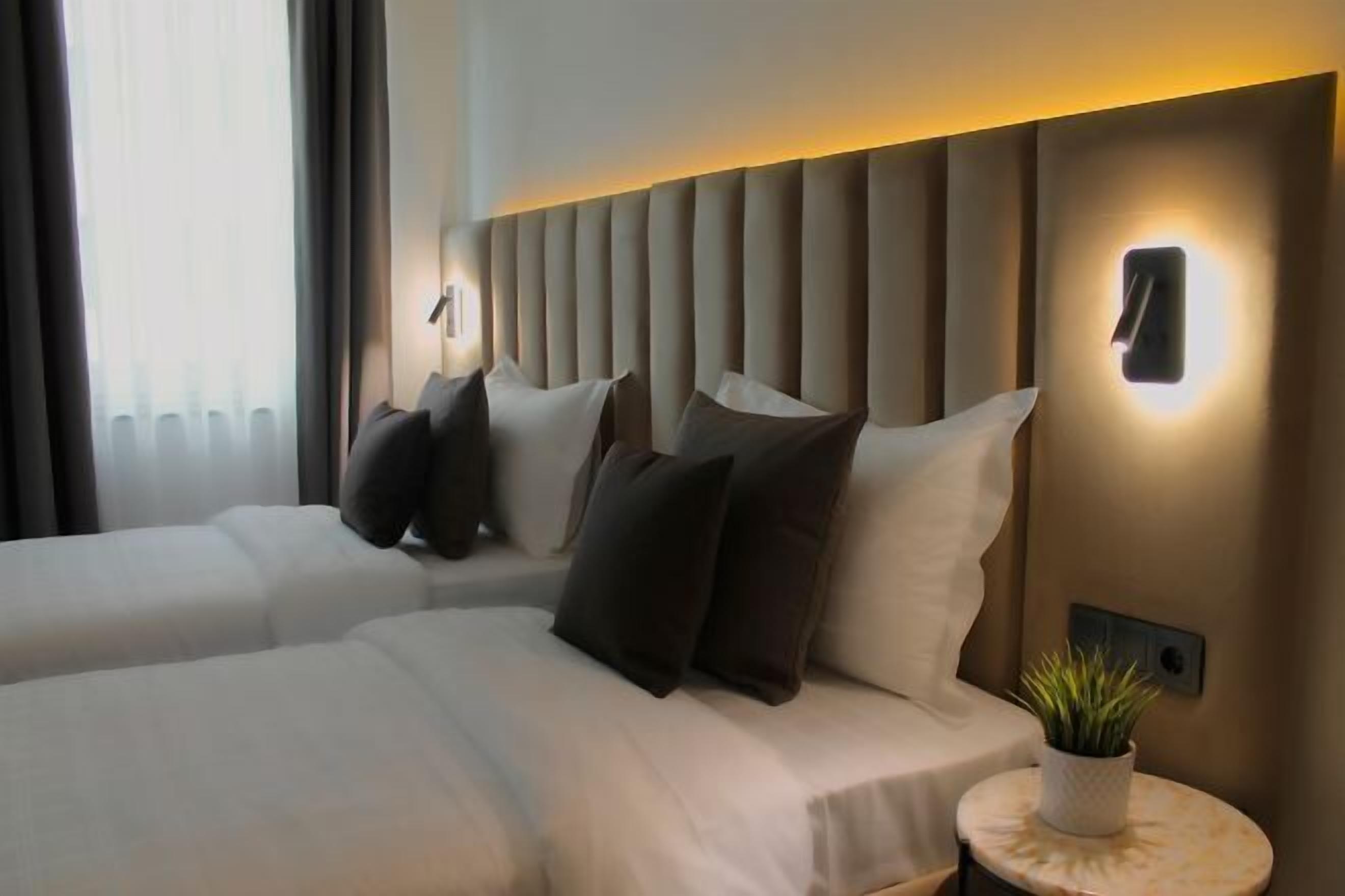 Hypo-allergenic bedding, free minibar items, in-room safe