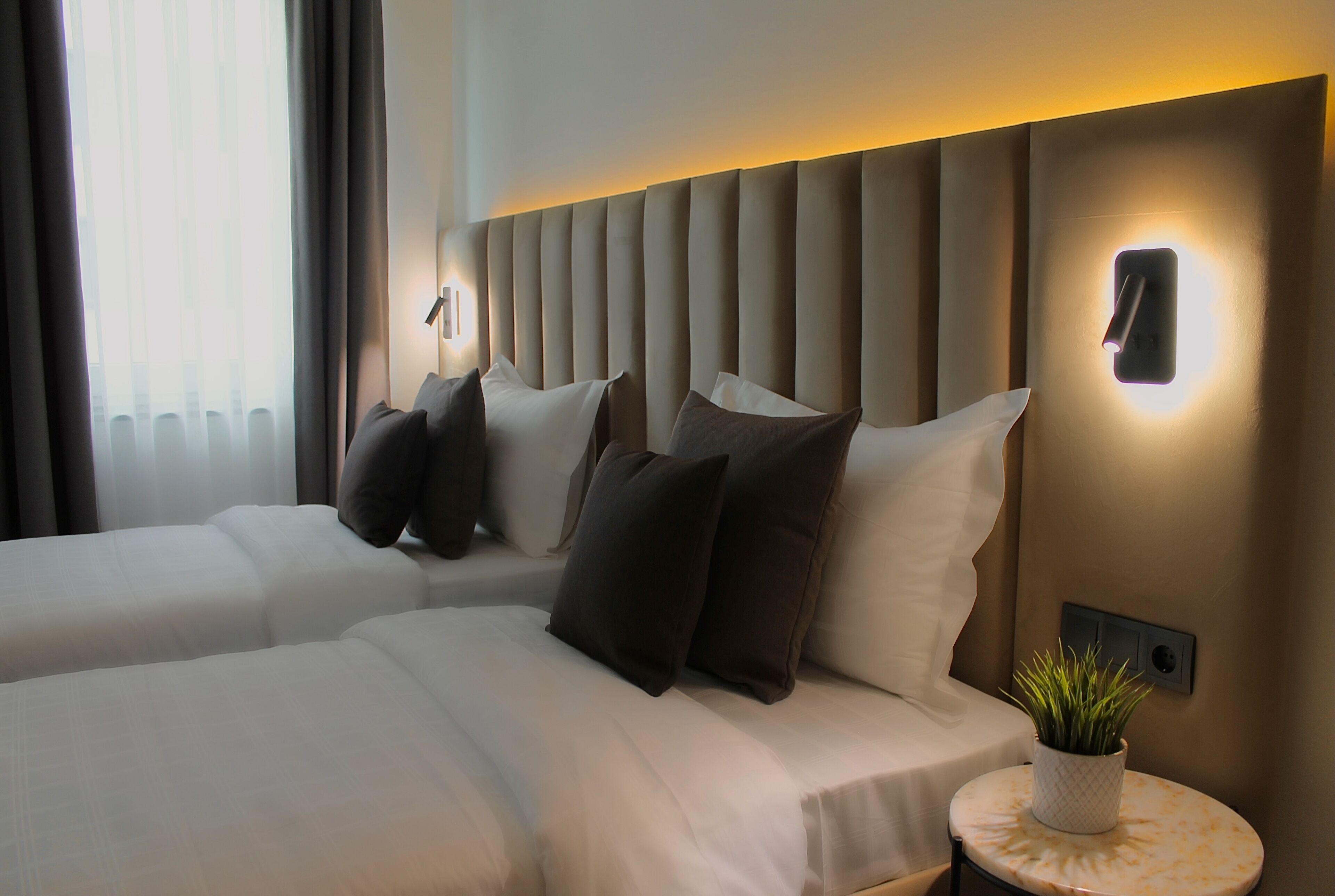 Hypo-allergenic bedding, free minibar items, in-room safe