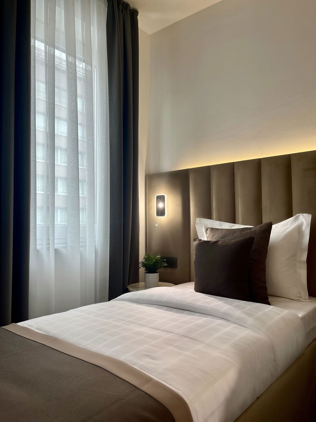 Hypo-allergenic bedding, free minibar items, in-room safe