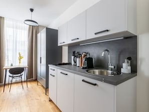 Single Suite (limehome Villach Gerbergasse) | Private kitchen | Fridge, espresso maker, electric kettle, toaster