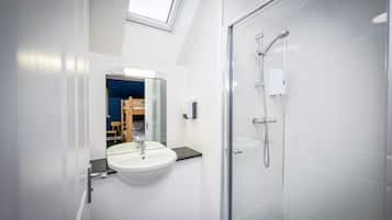 Shower, hydromassage showerhead, towels