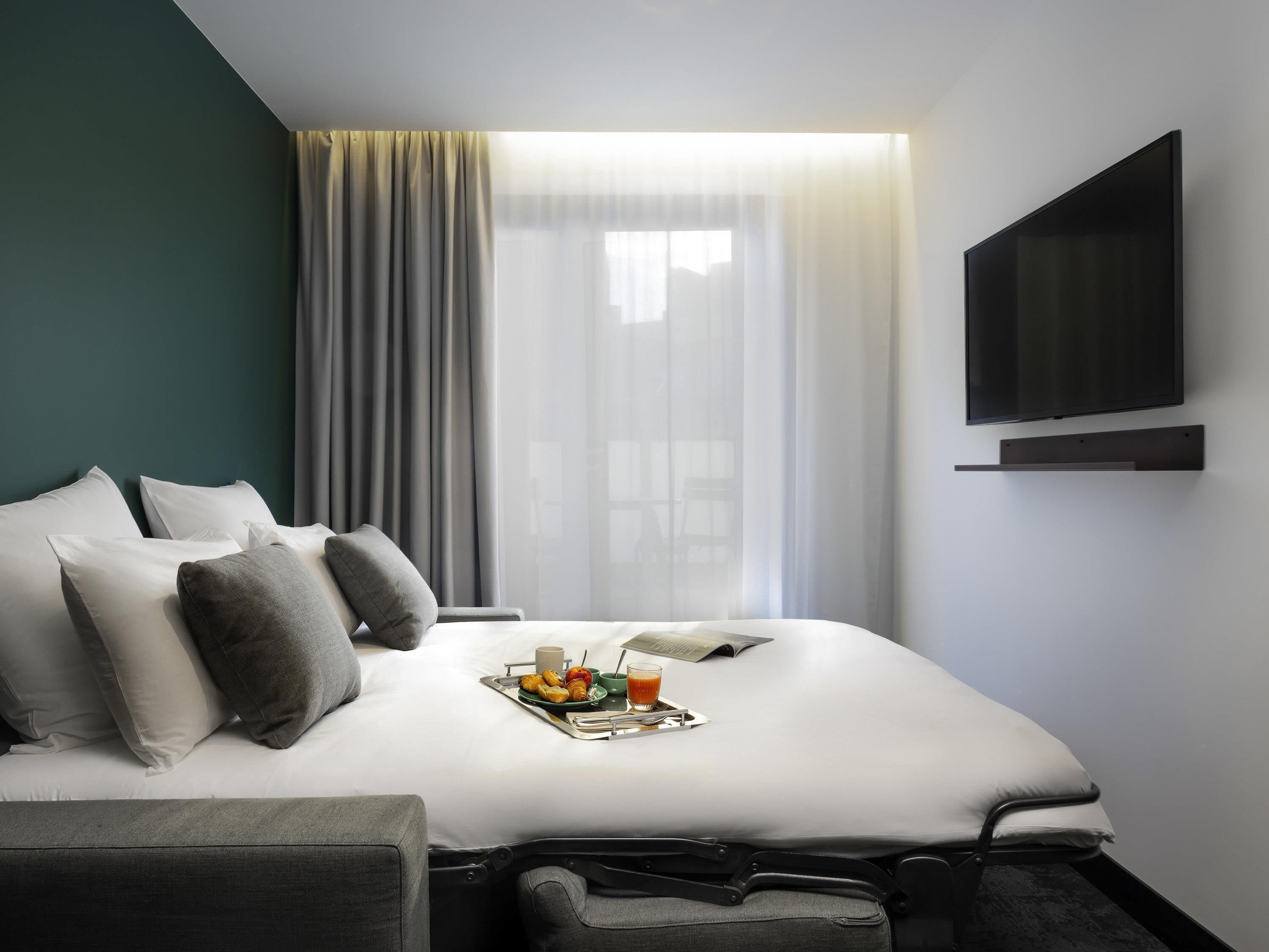 Literie de qualité supérieure, surmatelas, minibar