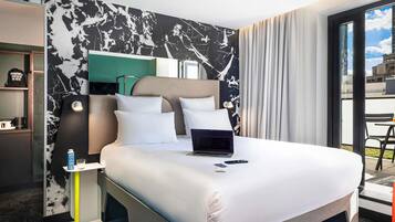 Ropa de cama de alta calidad, colchones con pillow-top y minibar