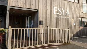 A wooden building with the sign 'ESYA RETAILBACK SPA HEALTH CLUB'. - Redwood, Retallack (St. Columb Major)