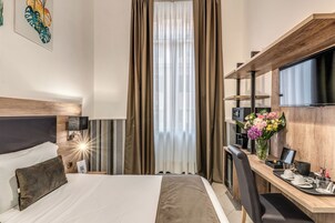 Habitación superior con 1 cama doble o 2 individuales | Minibar, caja fuerte, wifi gratis y ropa de cama