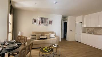 Apartment, 1 Bedroom | Living area | Smart TV