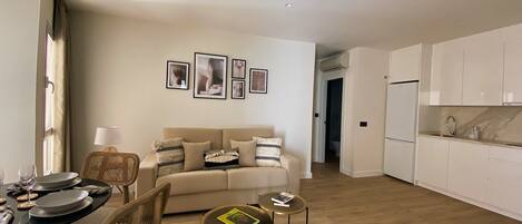 Apartment, 1 Bedroom | Living area | Smart TV