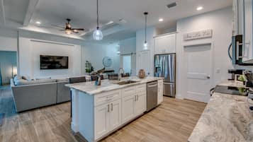 Villa | Private kitchen | Full-size fridge, microwave, oven, dishwasher