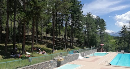 CHALET TRADITIONNEL situé à Barcelonnette sur 2 étages.