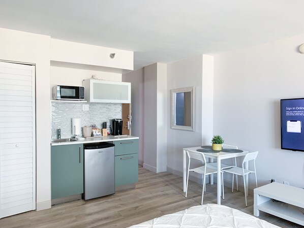 Fridge, microwave, coffee/tea maker, toaster