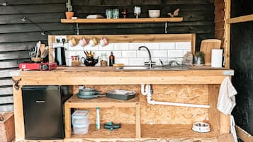 Cabin | Private kitchen | Fridge, stovetop, electric kettle, toaster
