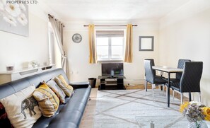 Apartment | Living area | 30-inch TV with digital channels