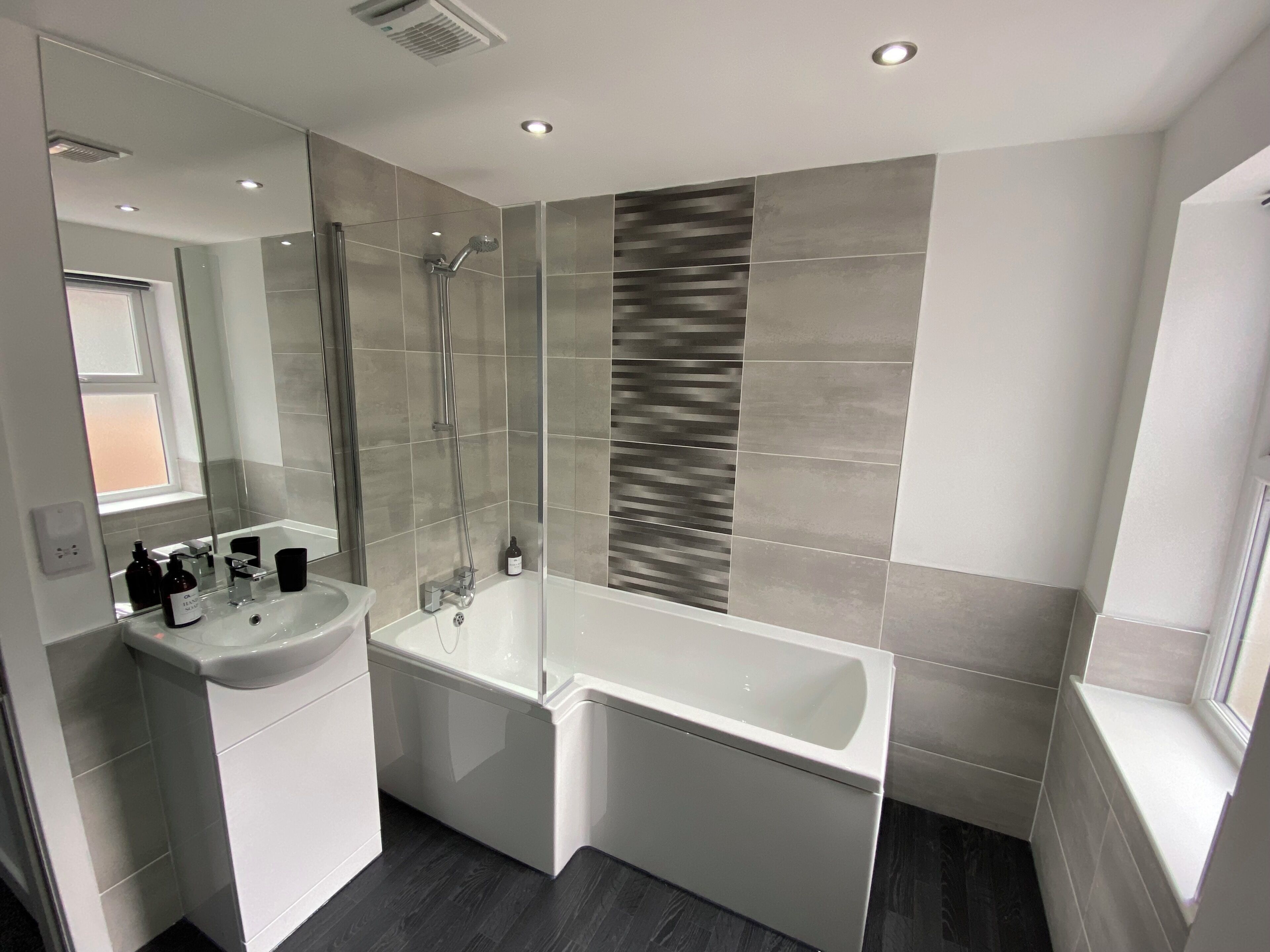 Combined shower/bathtub, hair dryer
