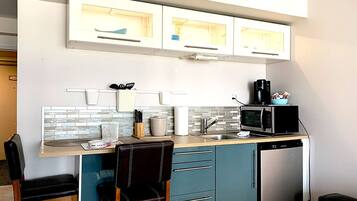 Fridge, microwave, coffee/tea maker, toaster