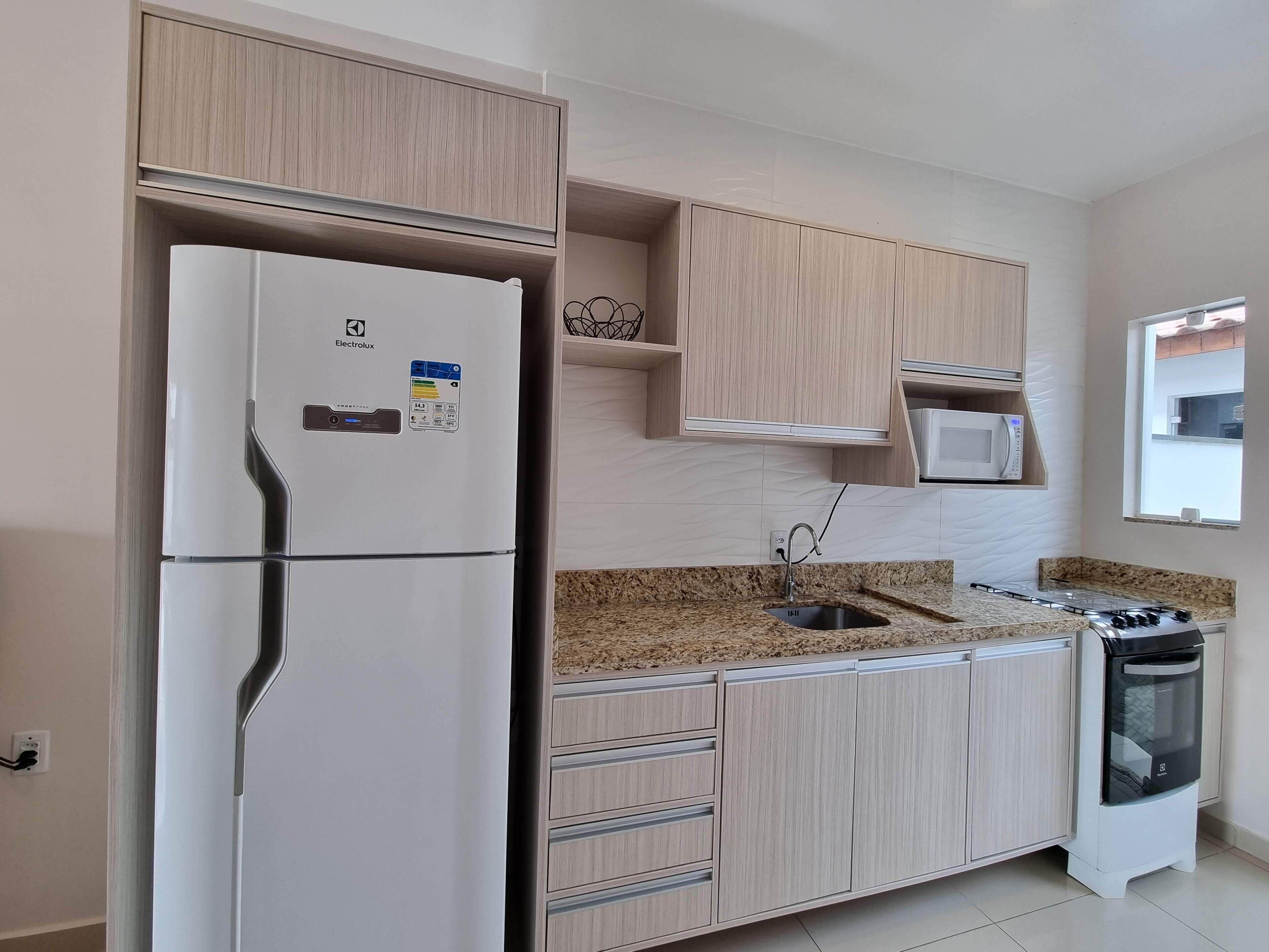 Refrigerador, horno, parrilla de estufa y tostadora 