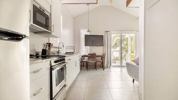 Microwave, coffee/tea maker, cookware/dishes/utensils, paper towels