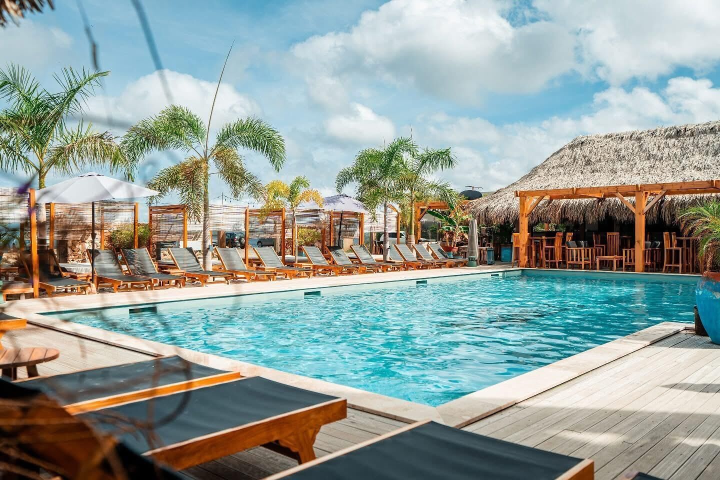 Outdoor pool, free cabanas, pool umbrellas