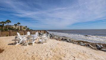 On the beach, sun-loungers, beach towels
