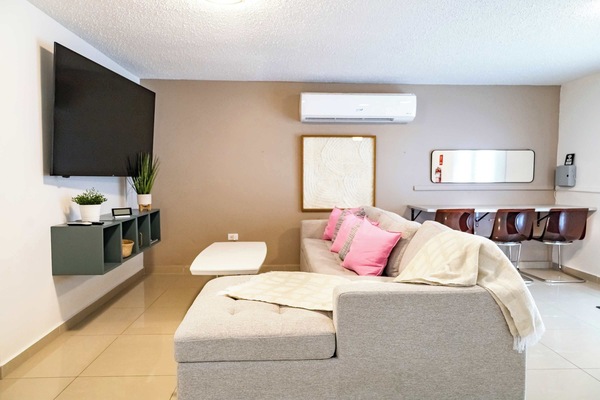 Living Area with Sofa Bed & TV