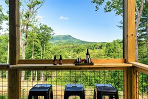 Outdoor dining - Mt. Views! A+ Location! Hot Tub! Arcades! Fire Pit! Swing! Privacy! 5miles to PF (Sevierville)