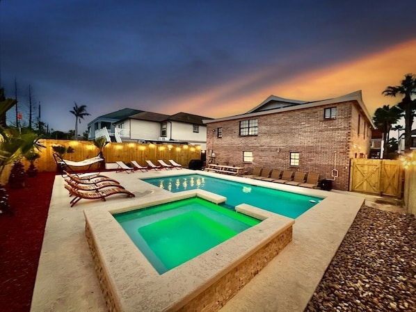 A heated pool, pool loungers