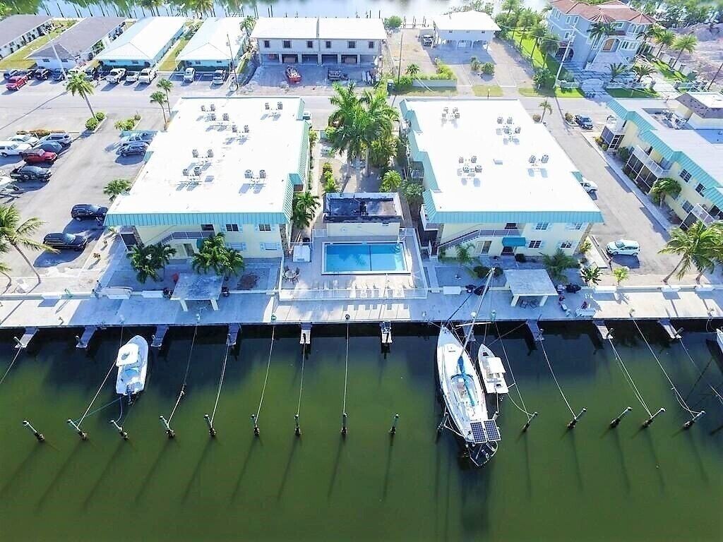 Turtles Nest. Amazing 2/2 with private ramp, boat slip, heated pool and more! 