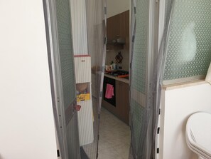 House, 2 Bedrooms, Patio | Private kitchen - Detached House on the Ground Floor in San Foca Ll77 (Melendugno)